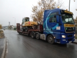Transport wózków widłowych maszyn koparek Poznań 604 999 084